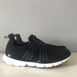 Black adidas golf shoes